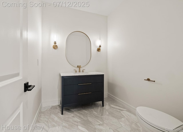 4743 S Ridge Dr, West Bloomfield, MI 48323 - half bathroom with vanity and marble finish floors