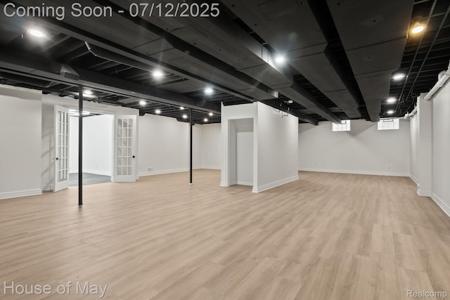 4743 S Ridge Dr, West Bloomfield, MI 48323 - below grade area featuring wood finished floors and baseboards
