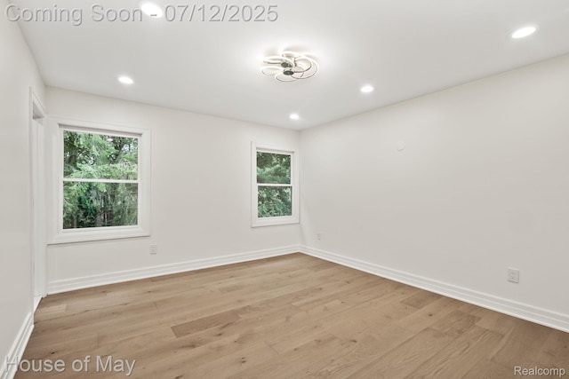 4743 S Ridge Dr, West Bloomfield, MI 48323 - empty room featuring light wood finished floors and recessed lighting