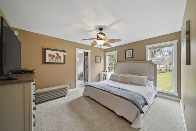 11259 Baker Rd, Jerome, MI 49249 - carpeted bedroom featuring baseboards and a ceiling fan