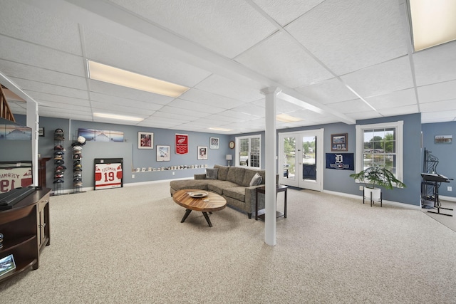 11259 Baker Rd, Jerome, MI 49249 - living room featuring a paneled ceiling, carpet floors, and french doors