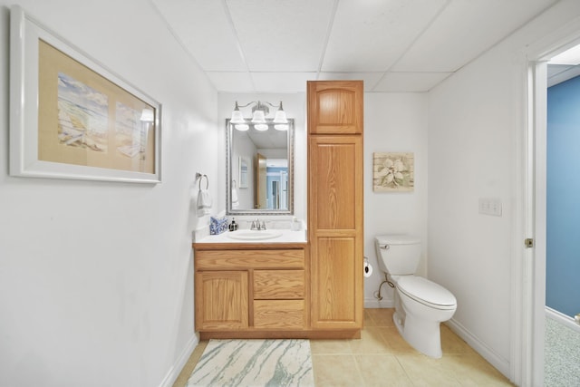 11259 Baker Rd, Jerome, MI 49249 - bathroom with vanity, tile patterned floors, and a paneled ceiling
