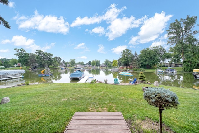 11259 Baker Rd, Jerome, MI 49249 - dock with a water view and a lawn