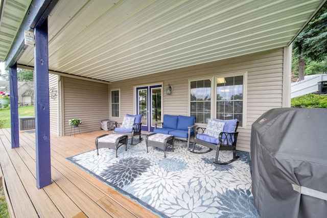 11259 Baker Rd, Jerome, MI 49249 - deck featuring an outdoor hangout area, a grill, and french doors
