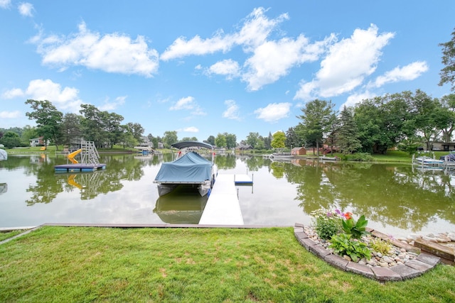 11259 Baker Rd, Jerome, MI 49249 - dock featuring a water view and a lawn
