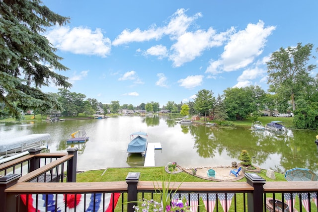 11259 Baker Rd, Jerome, MI 49249 - water view featuring a boat dock and a tree filled landscape