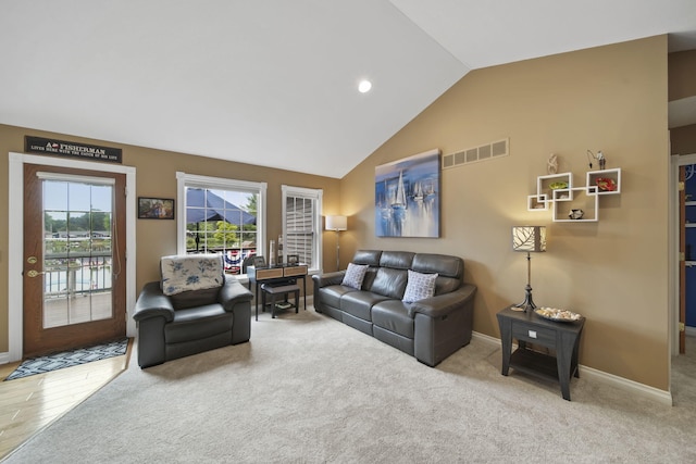 11259 Baker Rd, Jerome, MI 49249 - living room with lofted ceiling, recessed lighting, and carpet
