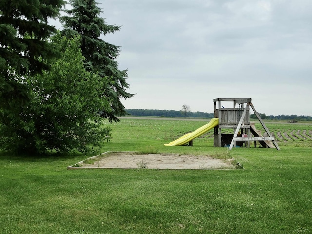 1570 Evon Rd, Saginaw, MI 48601 - view of jungle gym featuring a yard and a rural view