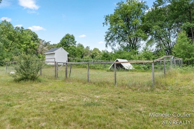 9583 E 5 Mile Rd, Big Rapids, MI 49307 - view of yard with an outdoor structure