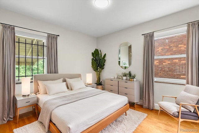 11110 Wayburn St, Grosse Pointe, MI 48224 - bedroom with light wood-style floors