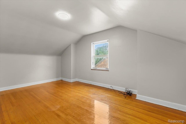 11110 Wayburn St, Grosse Pointe, MI 48224 - additional living space featuring light wood-type flooring and lofted ceiling