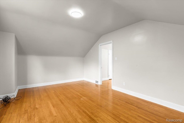 11110 Wayburn St, Grosse Pointe, MI 48224 - additional living space featuring lofted ceiling and light wood-style flooring