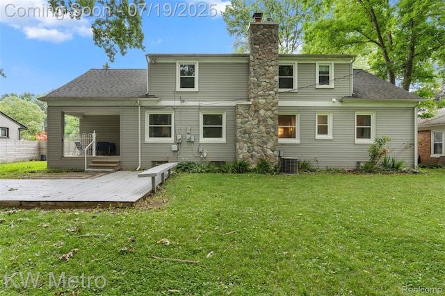 972 Goodale Ave, Clawson, MI 48017 - rear view of property featuring a chimney, a wooden deck, and roof with shingles