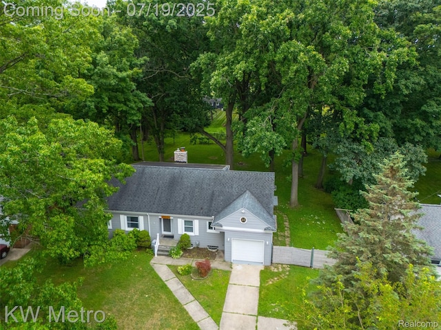 972 Goodale Ave, Clawson, MI 48017 - view of front of house with an attached garage, driveway, and a shingled roof