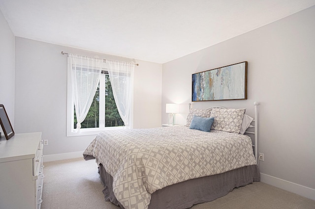 7751 Austinridge Dr SE, Caledonia, MI 49316 - bedroom featuring light carpet and baseboards