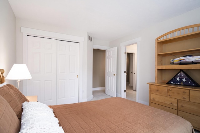 7751 Austinridge Dr SE, Caledonia, MI 49316 - bedroom featuring a closet and baseboards