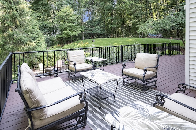7751 Austinridge Dr SE, Caledonia, MI 49316 - wooden terrace with a lawn and view of wooded area