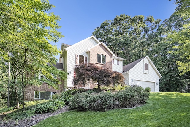 7751 Austinridge Dr SE, Caledonia, MI 49316 - view of property exterior with brick siding and a yard