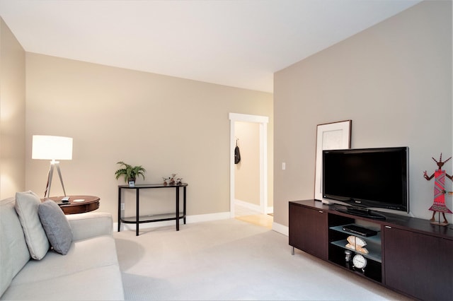 7751 Austinridge Dr SE, Caledonia, MI 49316 - living area featuring light carpet and baseboards