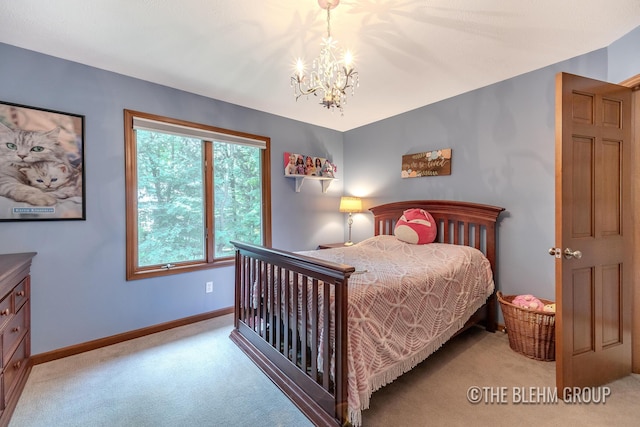 6340 Cannon Highlands Dr NE, Belmont, MI 49306 - bedroom with carpet flooring and a chandelier