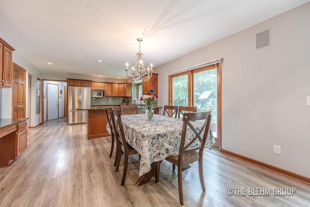 6340 Cannon Highlands Dr NE, Belmont, MI 49306 - dining space with a chandelier, light wood-style flooring, and recessed lighting