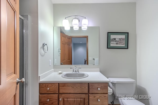 6340 Cannon Highlands Dr NE, Belmont, MI 49306 - bathroom with vanity and a shower with shower door