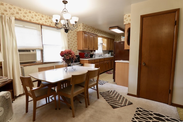 1340 Elmdale St NE, Grand Rapids, MI 49525 - dining area featuring a chandelier, wallpapered walls, light carpet, and cooling unit