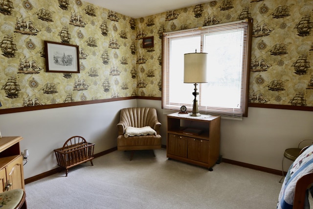 1340 Elmdale St NE, Grand Rapids, MI 49525 - sitting room with healthy amount of natural light, light colored carpet, and wallpapered walls