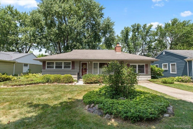 15588 Kirkshire Ave, Beverly Hills, MI 48025 - ranch-style house with a chimney and a front yard