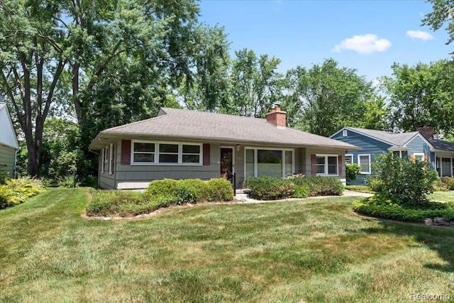 15588 Kirkshire Ave, Beverly Hills, MI 48025 - ranch-style home with a front lawn and a chimney
