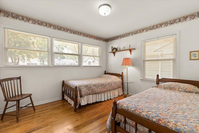 15588 Kirkshire Ave, Beverly Hills, MI 48025 - bedroom with light wood finished floors and baseboards