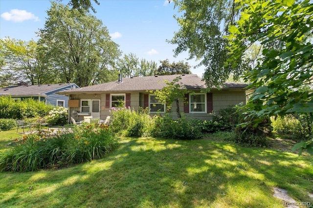 15588 Kirkshire Ave, Beverly Hills, MI 48025 - back of house featuring a yard