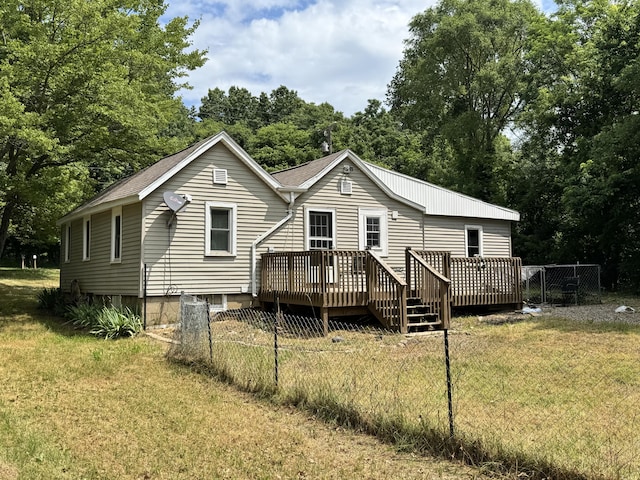 1230 Golden Ave, Battle Creek, MI 49014 - rear view of house with a wooden deck