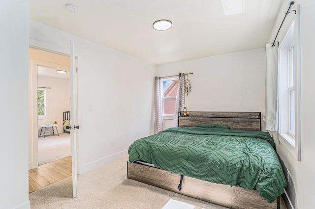 1213 Prospect Ave SE, Grand Rapids, MI 49507 - carpeted bedroom featuring baseboards