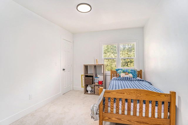 1213 Prospect Ave SE, Grand Rapids, MI 49507 - bedroom with carpet flooring and baseboards