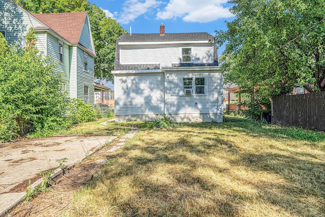 1213 Prospect Ave SE, Grand Rapids, MI 49507 - back of property with a chimney