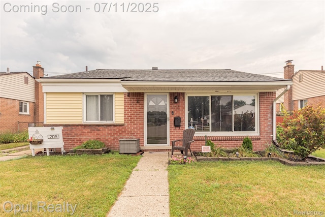 205 Shotka St, Westland, MI 48186 - bungalow-style home with brick siding and a front lawn