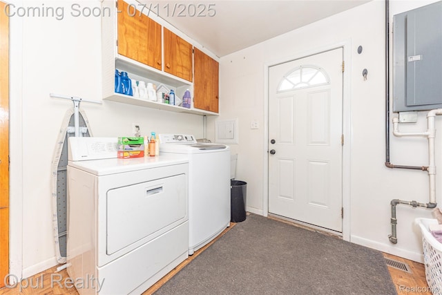 205 Shotka St, Westland, MI 48186 - laundry area featuring electric panel and washer and clothes dryer