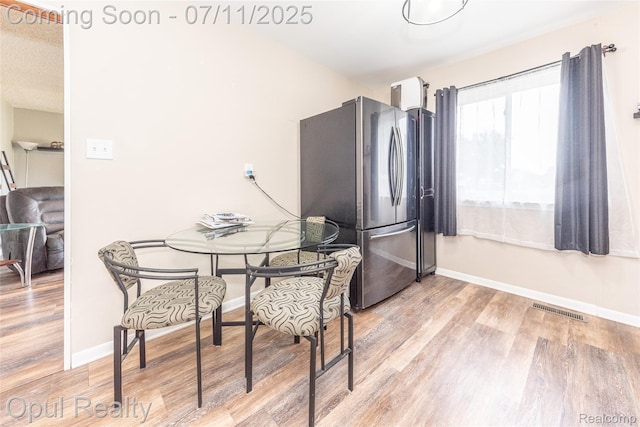 205 Shotka St, Westland, MI 48186 - dining area with light wood finished floors and baseboards