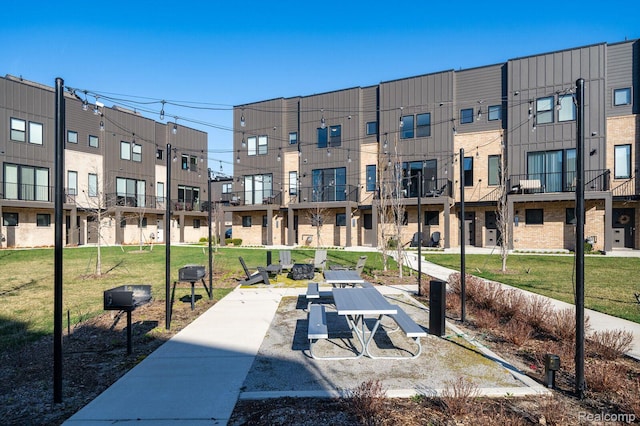 1087 Hampton Cir Unit 55, Detroit, MI 48207 - view of community featuring a residential view and a lawn