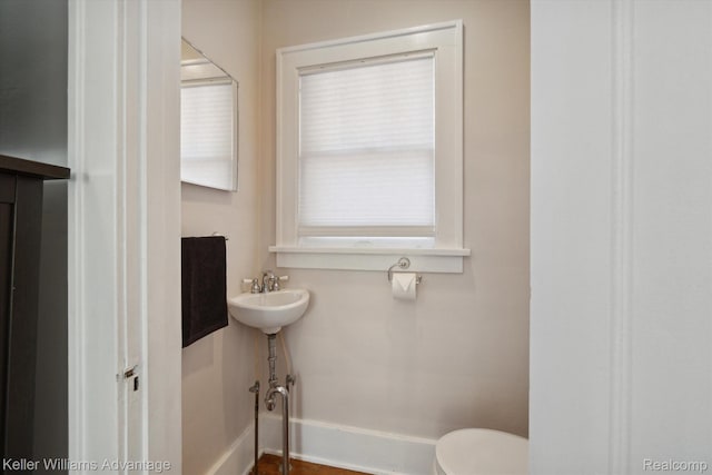 402 E 7th St, Royal Oak, MI 48067 - half bath featuring toilet and baseboards