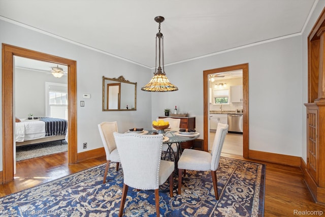 402 E 7th St, Royal Oak, MI 48067 - dining area with wood finished floors and crown molding