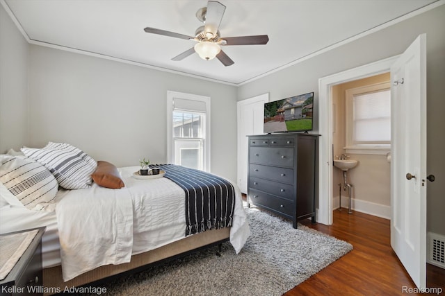 402 E 7th St, Royal Oak, MI 48067 - bedroom featuring wood finished floors, crown molding, a ceiling fan, and ensuite bath
