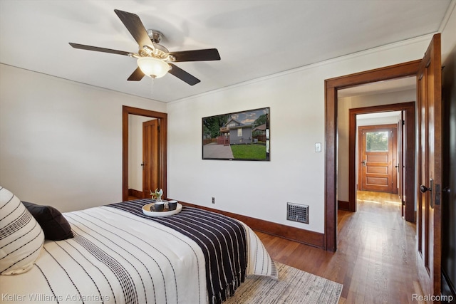 402 E 7th St, Royal Oak, MI 48067 - bedroom featuring wood finished floors and a ceiling fan