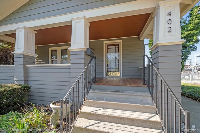 402 E 7th St, Royal Oak, MI 48067 - view of exterior entry with a porch