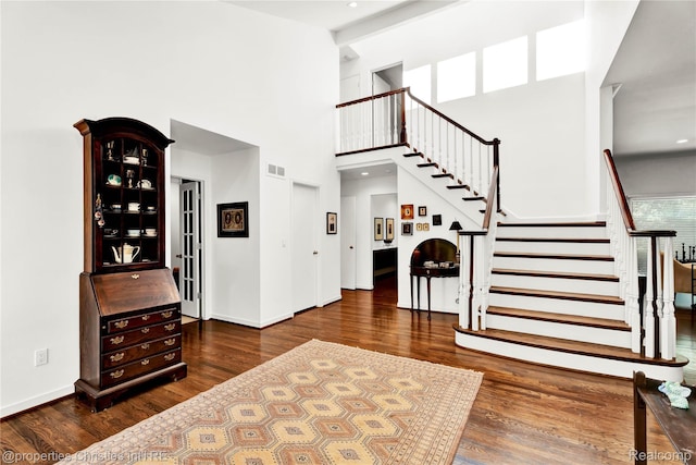 4768 Wendrick Dr, West Bloomfield, MI 48323 - entrance foyer featuring wood finished floors, stairway, and a high ceiling