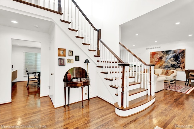 4768 Wendrick Dr, West Bloomfield, MI 48323 - stairway featuring wood finished floors and recessed lighting