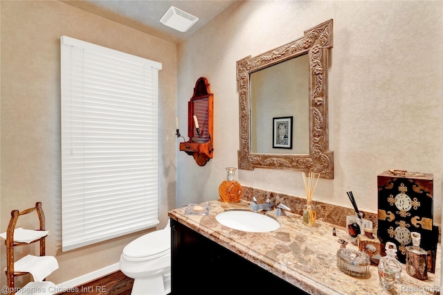 4768 Wendrick Dr, West Bloomfield, MI 48323 - half bathroom with vanity and wood finished floors