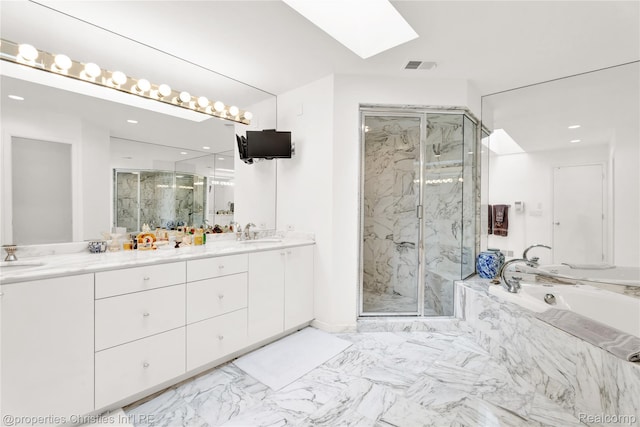 4768 Wendrick Dr, West Bloomfield, MI 48323 - full bathroom with a marble finish shower, a garden tub, double vanity, a skylight, and marble finish floors