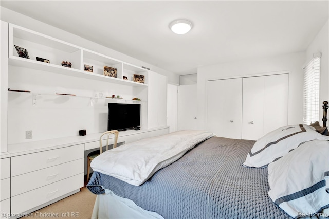 4768 Wendrick Dr, West Bloomfield, MI 48323 - bedroom with light colored carpet, built in study area, and a closet